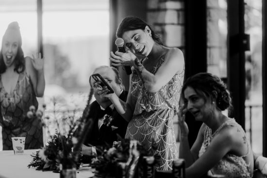 Maid of honor toasts the bride