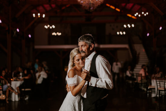 The bride and her dad dance