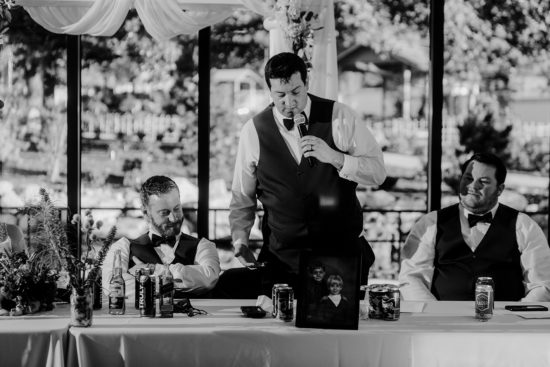 Best man toasting the groom