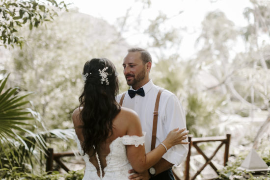 Groom and bride embrace after their first look during their destination wedding