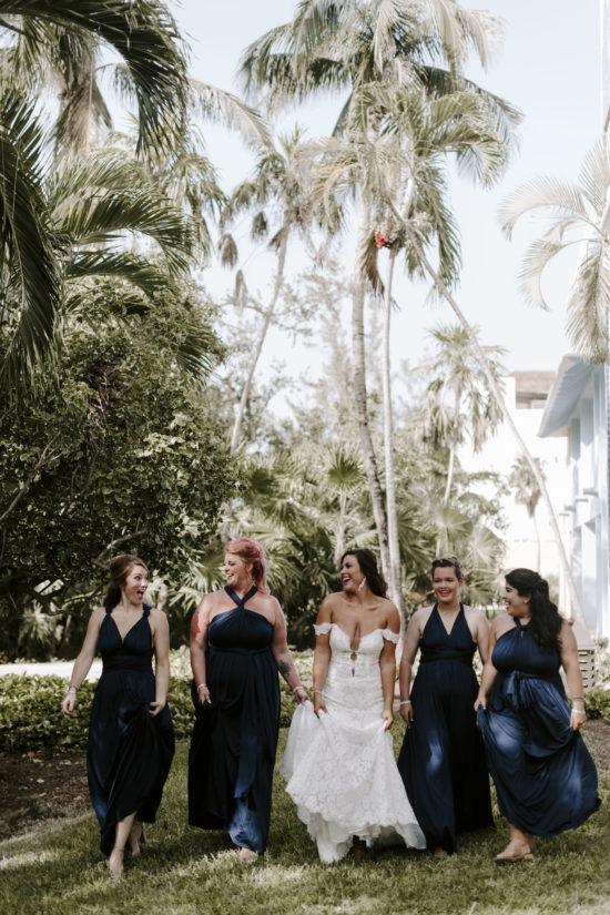 Bridesmaids share a moment with the bride at Mexico destination wedding