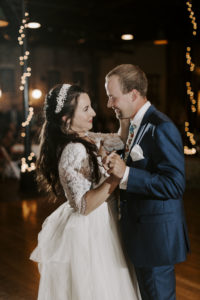 The newlyweds dance together at their Abe and Jake's wedding