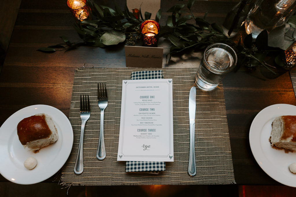 A table is set with formal silverware and a menu for the plated dinner at Rye on the Plaza in Kansas City.