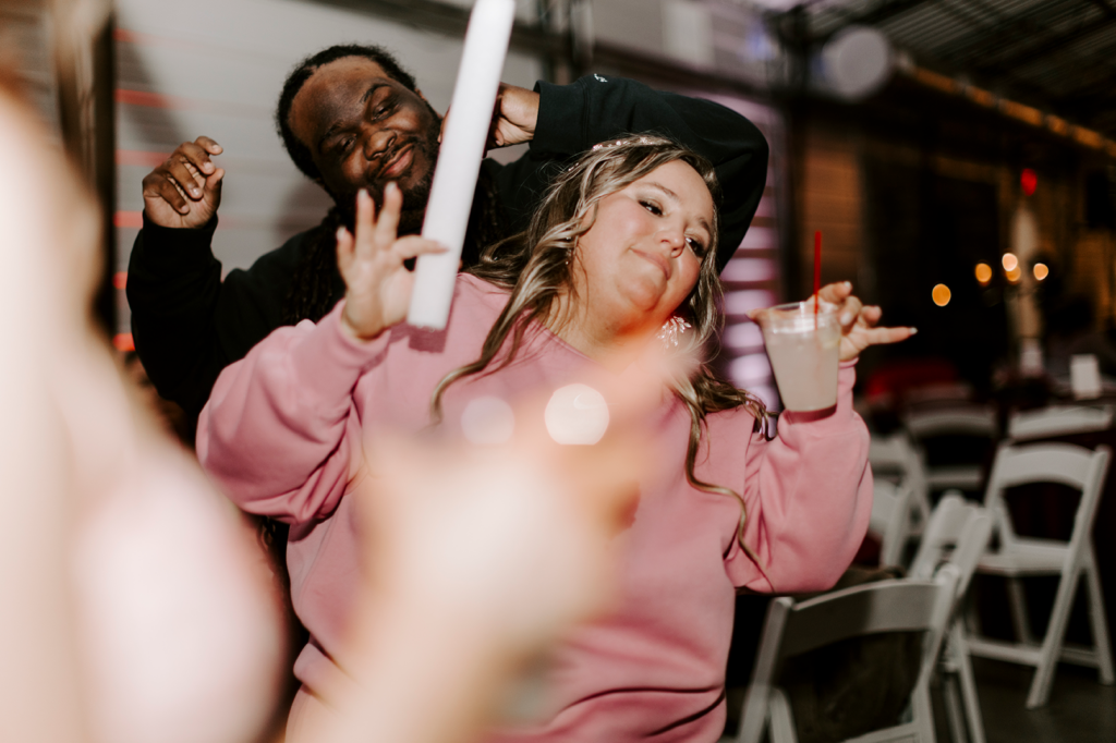 The bride and groom dance at their North Lawrence wedding reception.